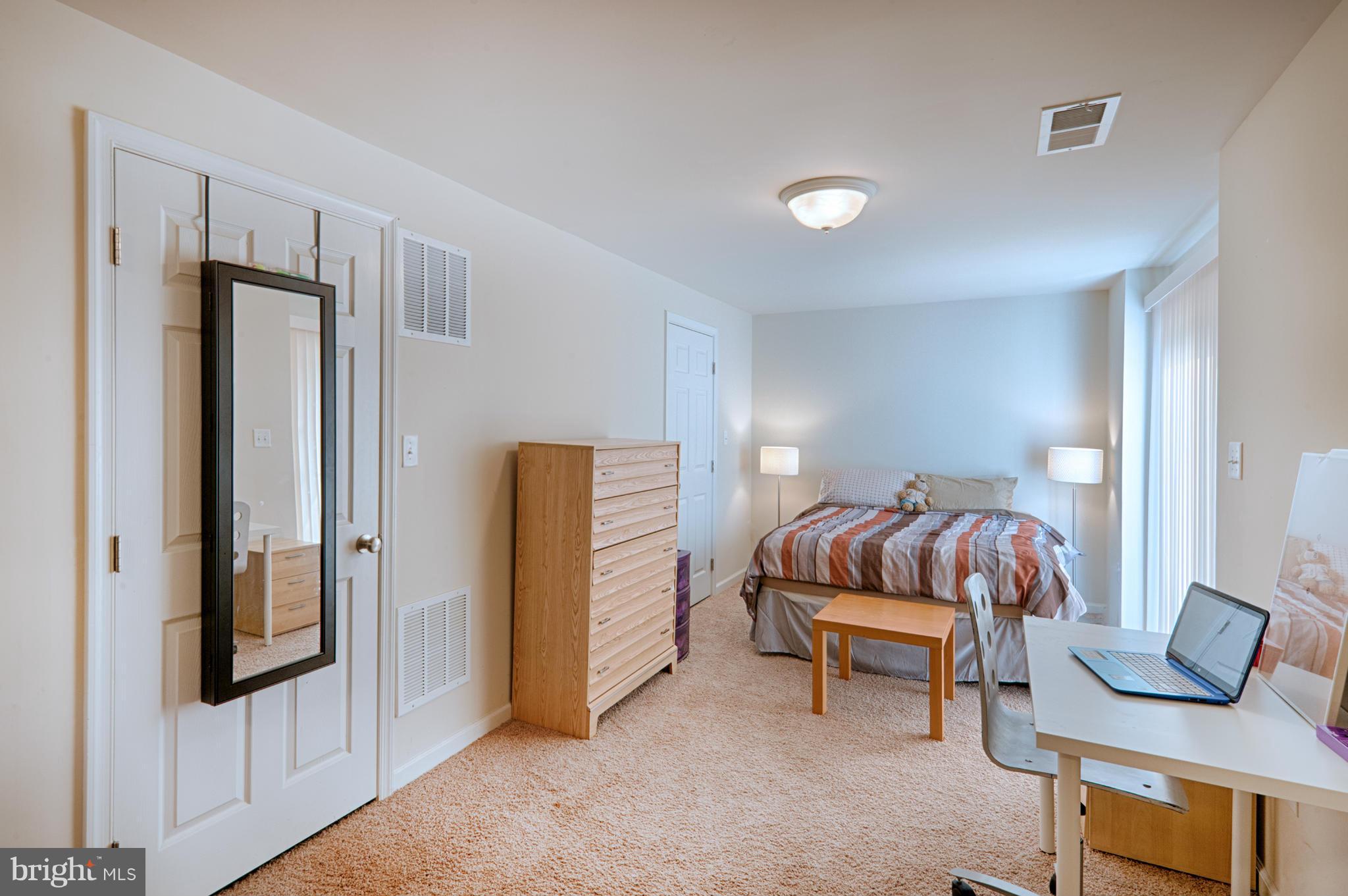 59 Haverhill Road Joppa, MD 21085 - Photo 23 of 28 a bedroom with furniture and natural light