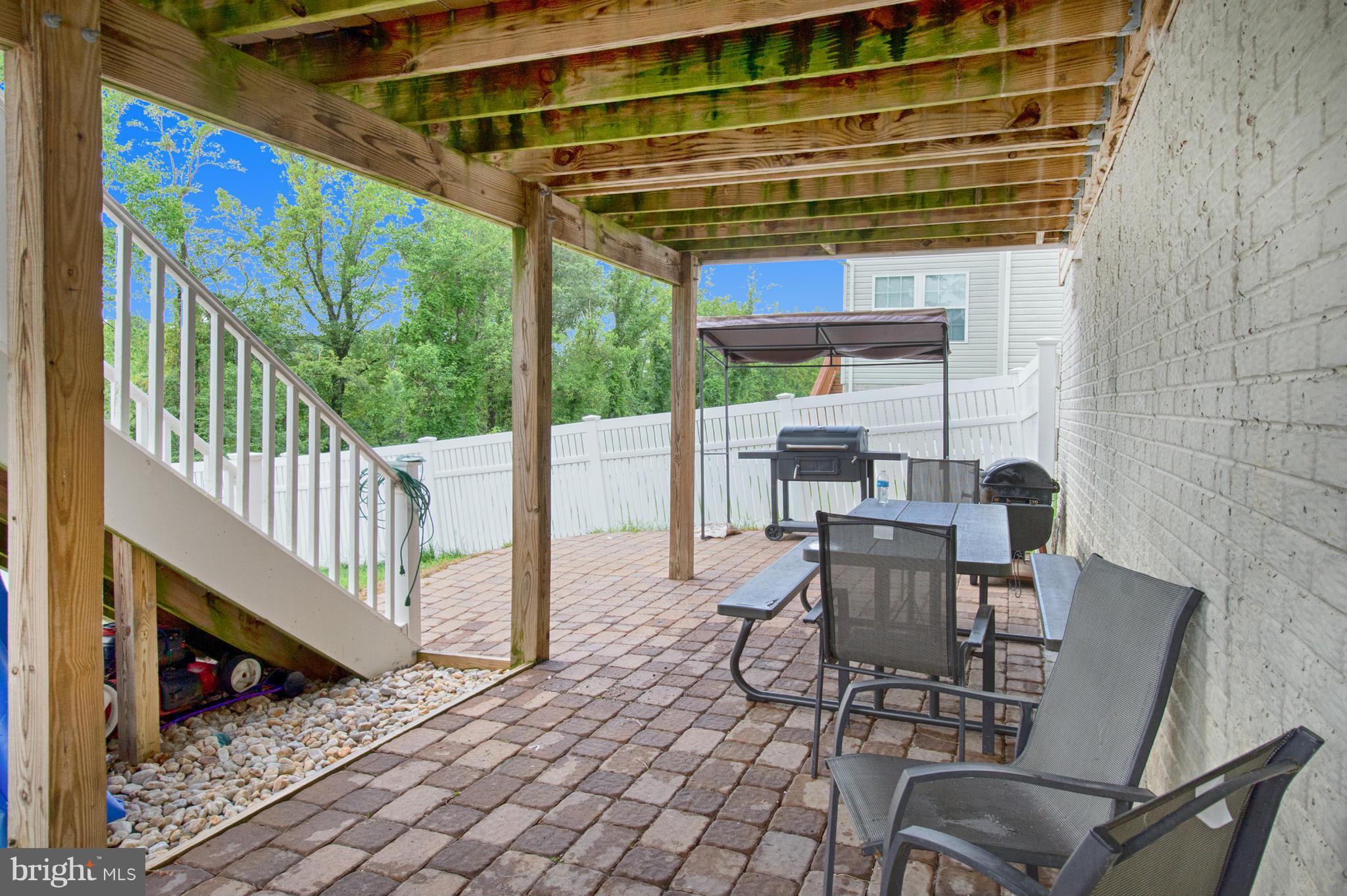 59 Haverhill Road Joppa, MD 21085 - Photo 24 of 28 a view of a chairs and table in the balcony