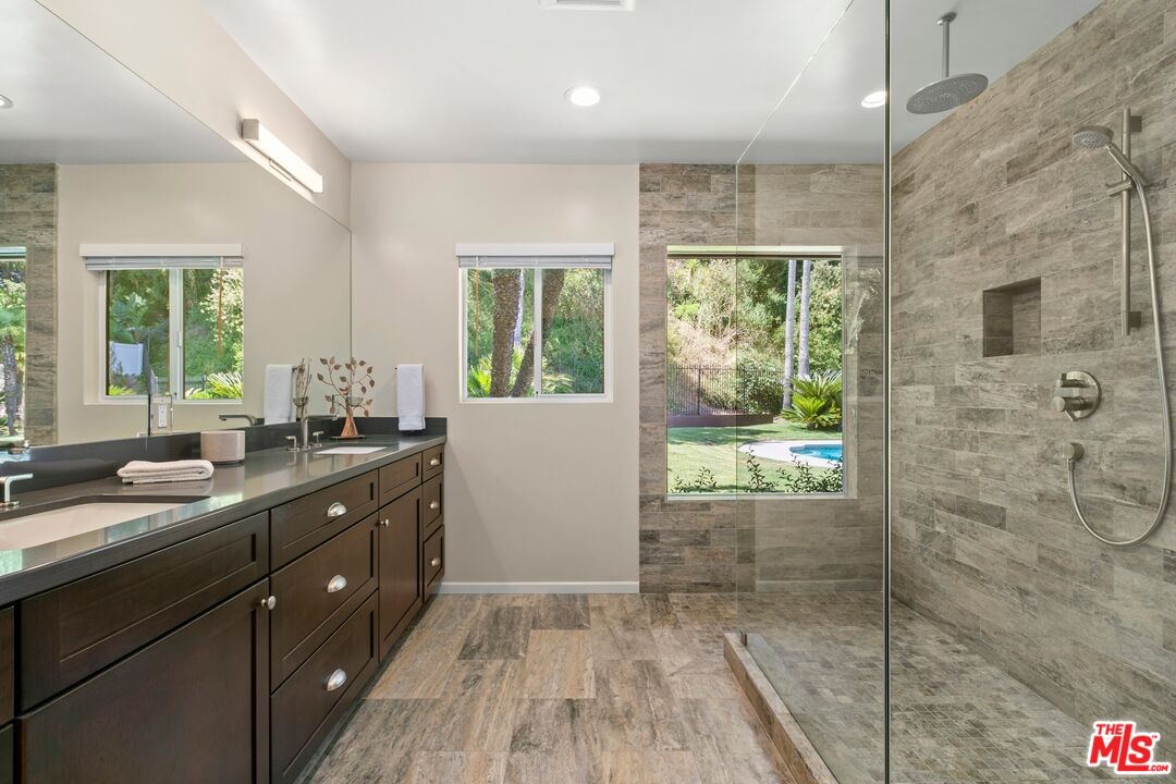 6523 Lakeridge Road Los Angeles, CA 90068 - Photo 16 of 28 a kitchen with a sink and large windows