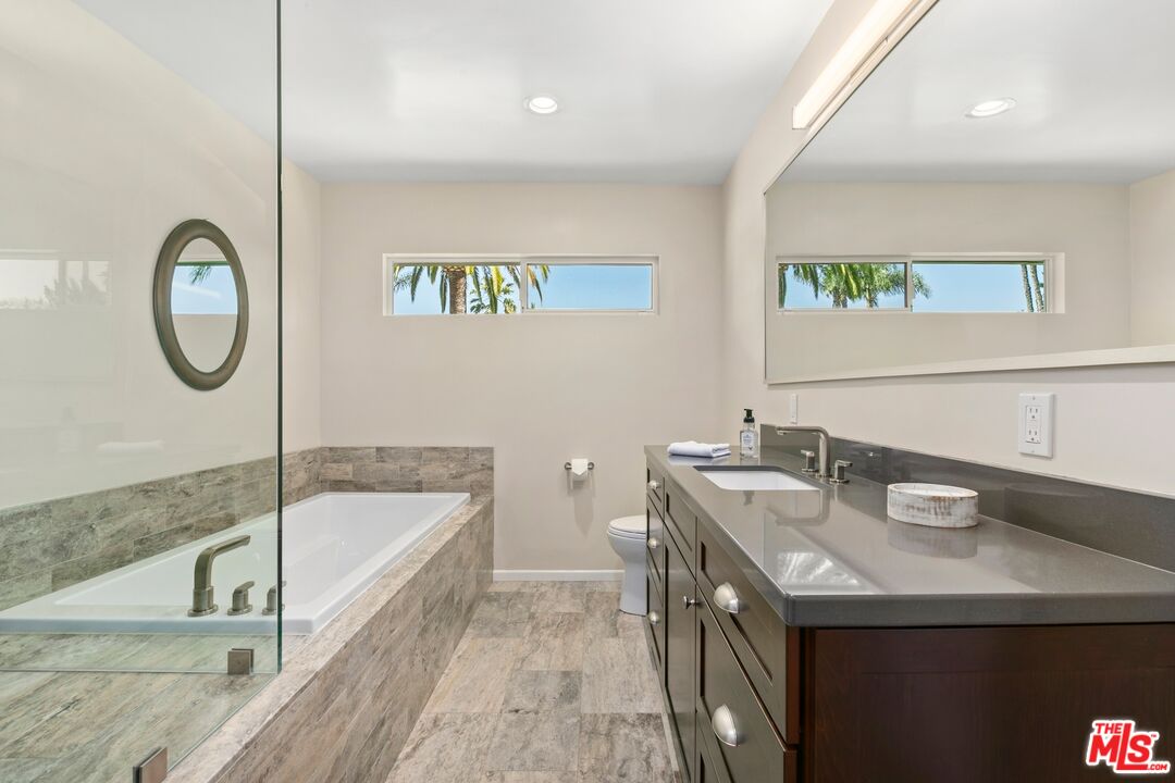6523 Lakeridge Road Los Angeles, CA 90068 - Photo 19 of 28 a bathroom with a sink and a bathtub