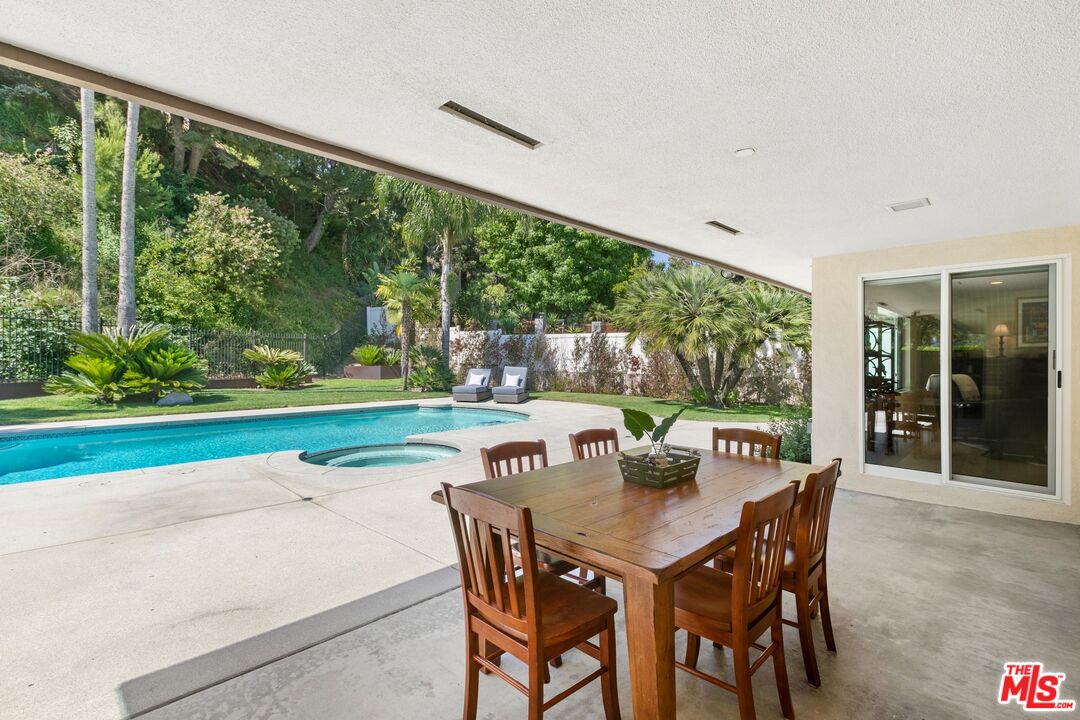 6523 Lakeridge Road Los Angeles, CA 90068 - Photo 4 of 28 a view of a patio with a yard
