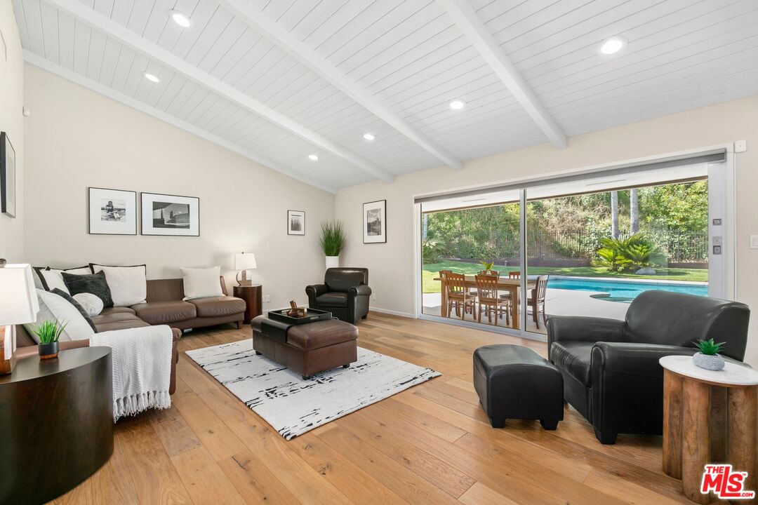 6523 Lakeridge Road Los Angeles, CA 90068 - Photo 6 of 28 a living room with furniture and a large window