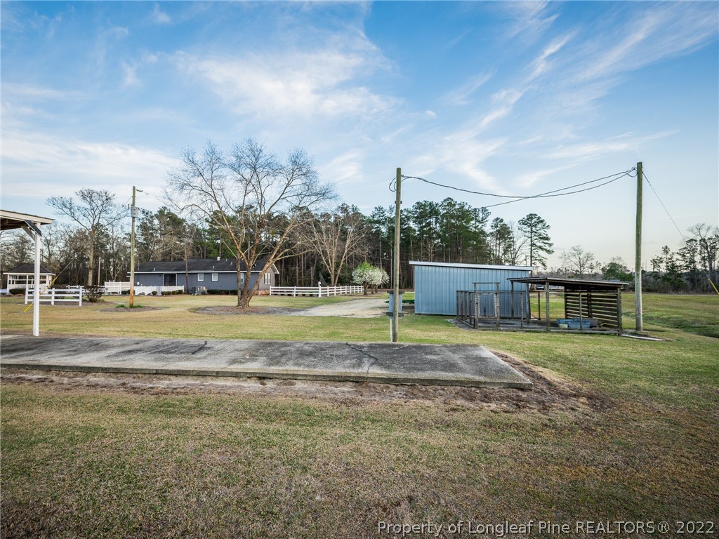 156 Pinewood Road Lumberton, NC 28358 - Photo 10 of 50 a view of a house with a yard