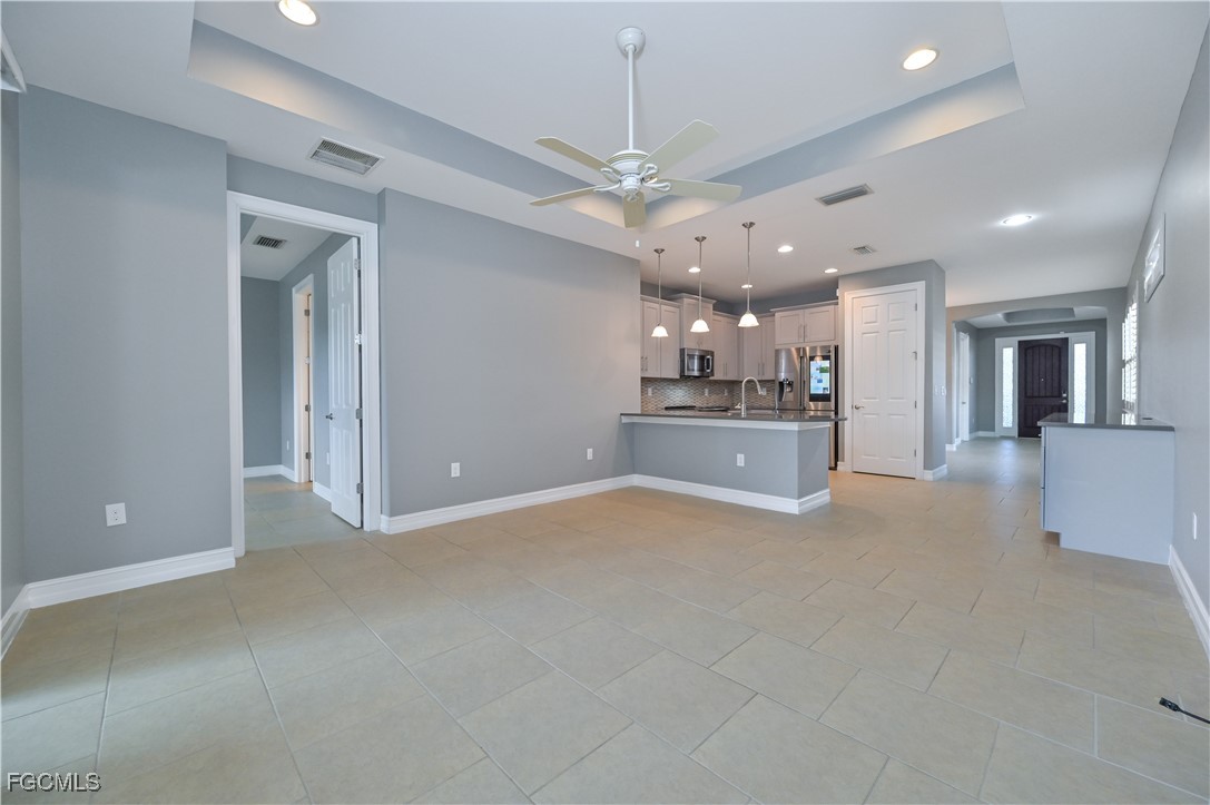 3571 Brittons Court Fort Myers, FL 33916 - Photo 12 of 42 a view of a kitchen with a stove cabinets