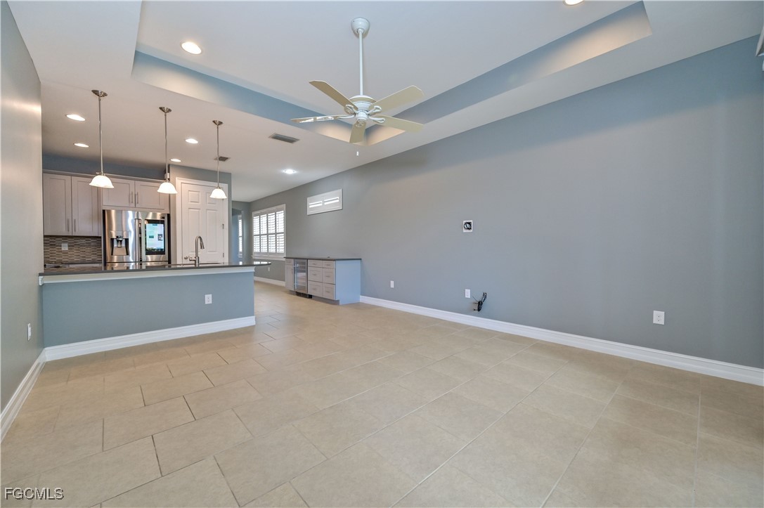 3571 Brittons Court Fort Myers, FL 33916 - Photo 13 of 42 a view of an empty room and kitchen view