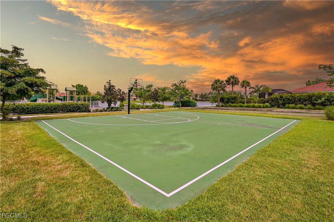 3571 Brittons Court Fort Myers, FL 33916 - Photo 39 of 42 a view of an outdoor space and tennis court