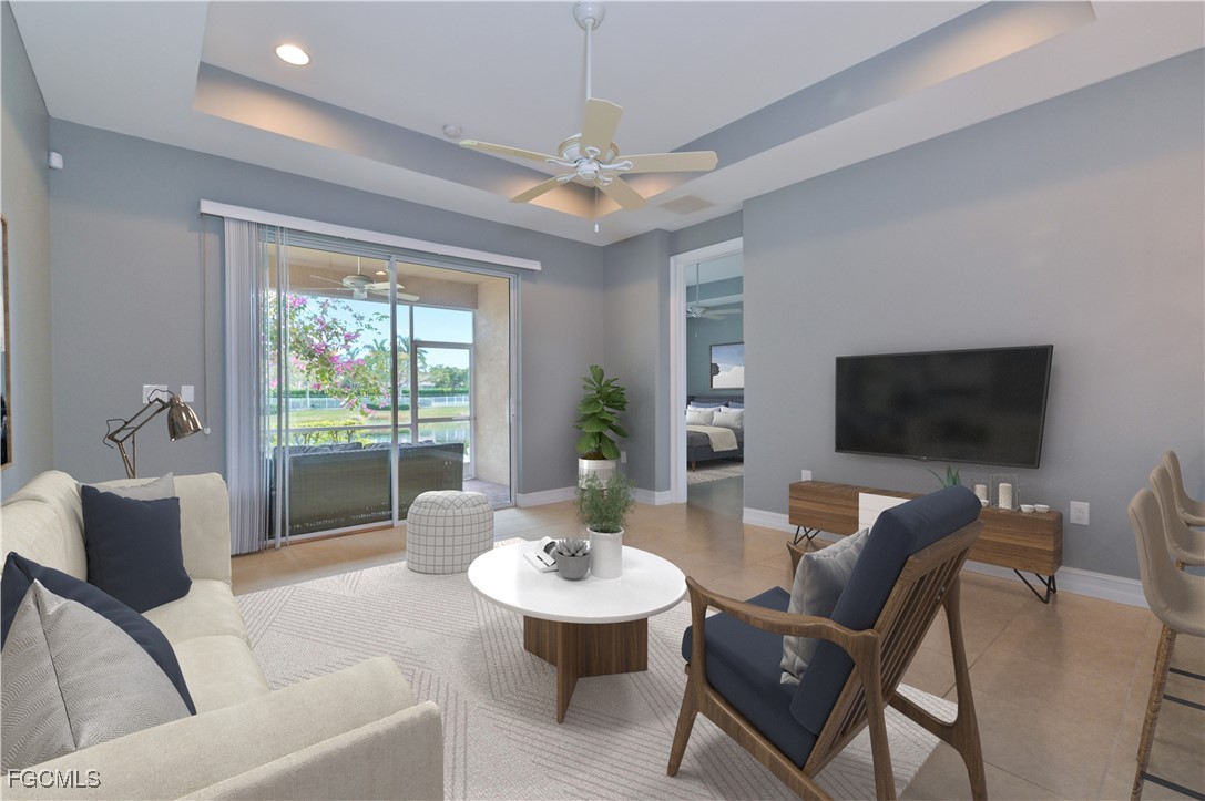 3571 Brittons Court Fort Myers, FL 33916 - Photo 8 of 42 a living room with furniture and a flat screen tv