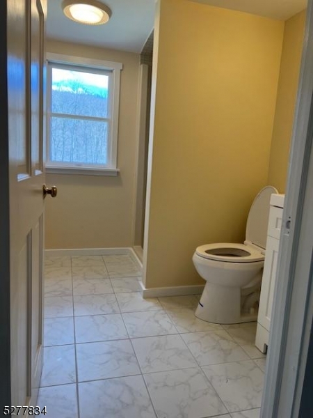 404 Stonetown Road Ringwood, NJ 07456 - Photo 12 of 13 a bathroom with a toilet