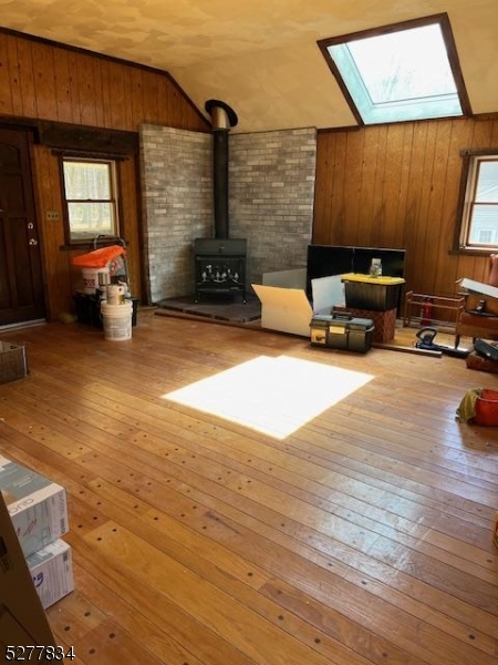404 Stonetown Road Ringwood, NJ 07456 - Photo 4 of 13 a living room with furniture and a flat screen tv