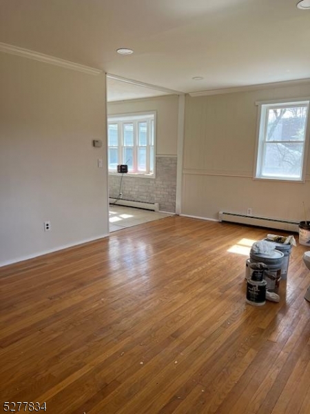 404 Stonetown Road Ringwood, NJ 07456 - Photo 6 of 13 a view of empty room with wooden floor