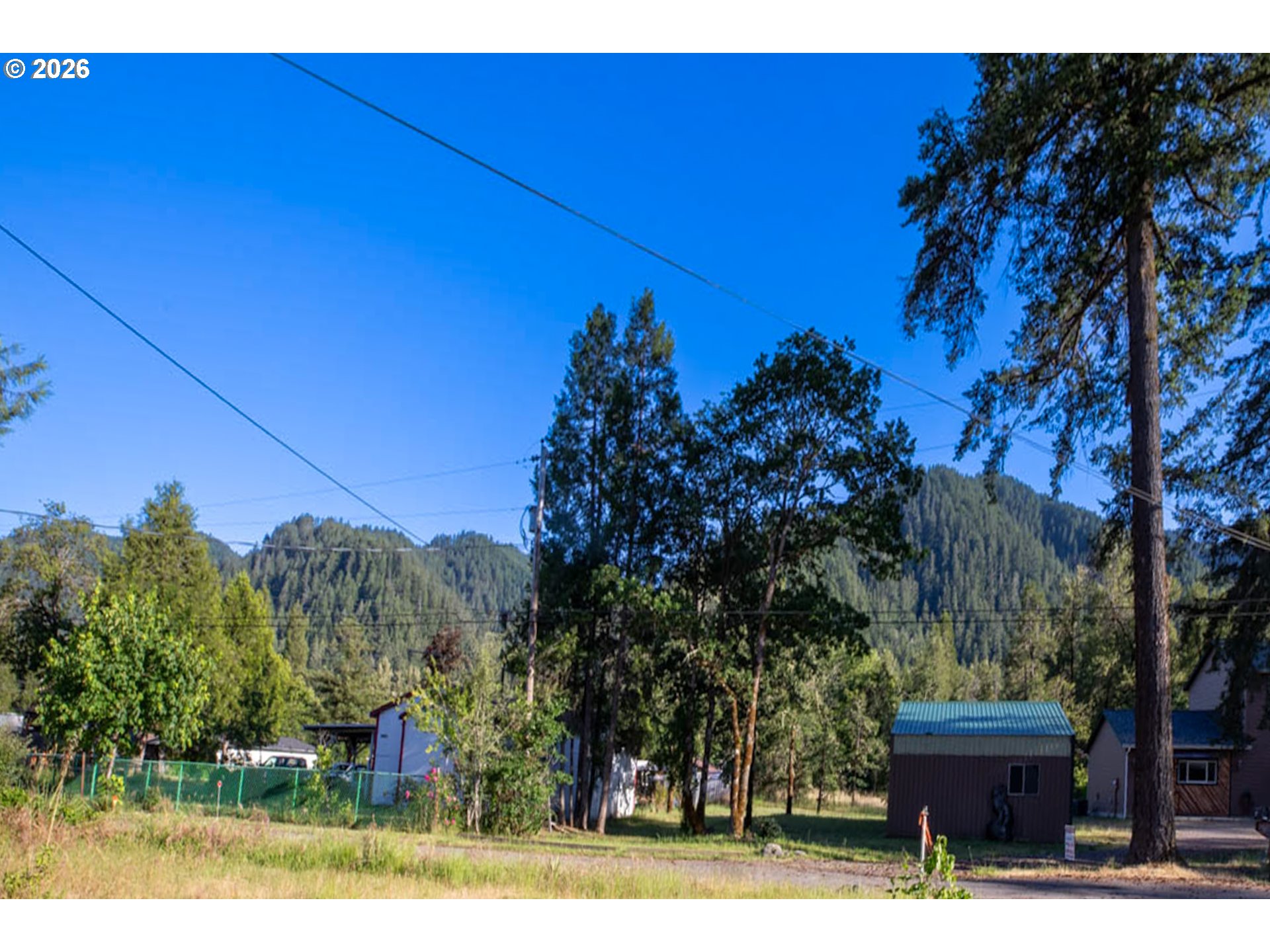 47433 School Street Oakridge, OR 97463 - Photo 16 of 16 a view of a house with a yard