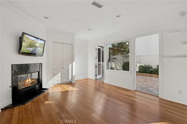 a view of a living room a window and a fireplace
