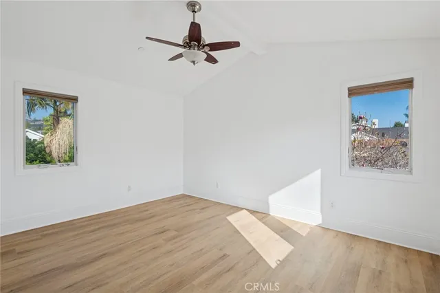 a view of a hallway with a window