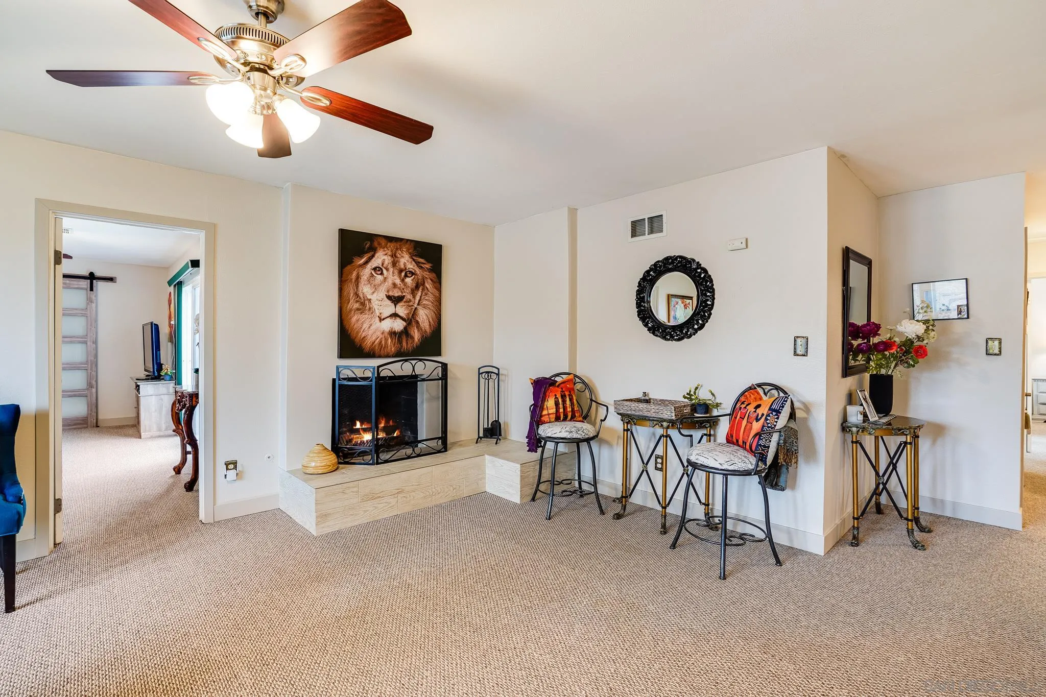 10420 Susie Place Santee, CA 92071 - Photo 11 of 26 a living room with furniture a fireplace and white walls