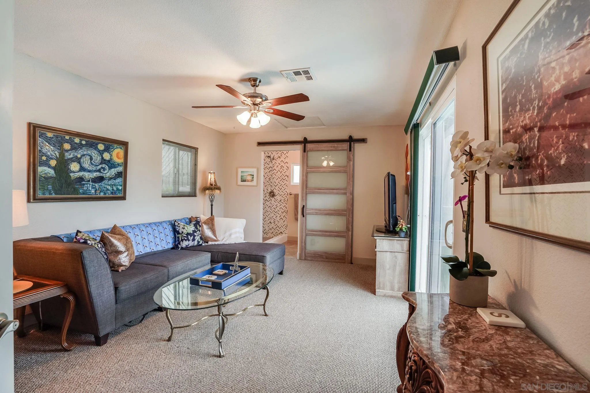 10420 Susie Place Santee, CA 92071 - Photo 12 of 26 a living room with furniture and a chandelier