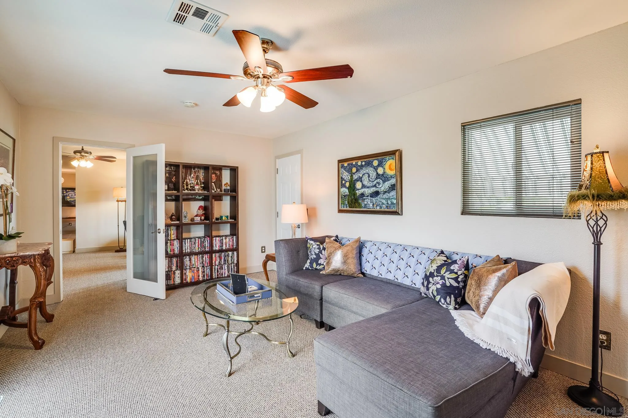 10420 Susie Place Santee, CA 92071 - Photo 13 of 26 a living room with furniture a air conditioner vent and a window