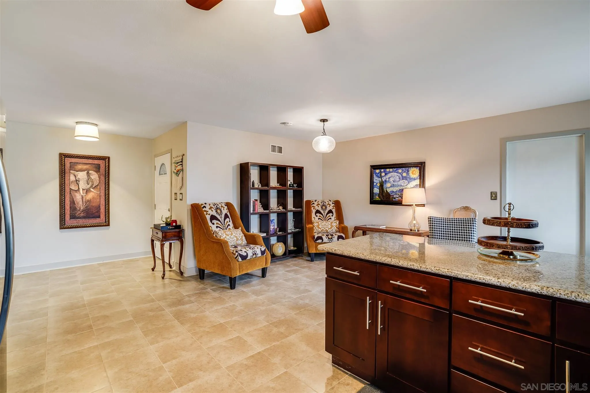 10420 Susie Place Santee, CA 92071 - Photo 7 of 26 a kitchen with a sink and a mirror
