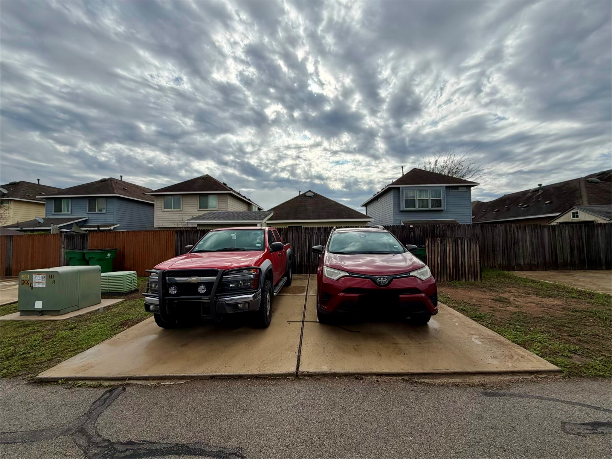 4508 Kind Way, Unit 249 Austin, TX 78725 - Photo 20 of 20 Alley access rear parking spots.