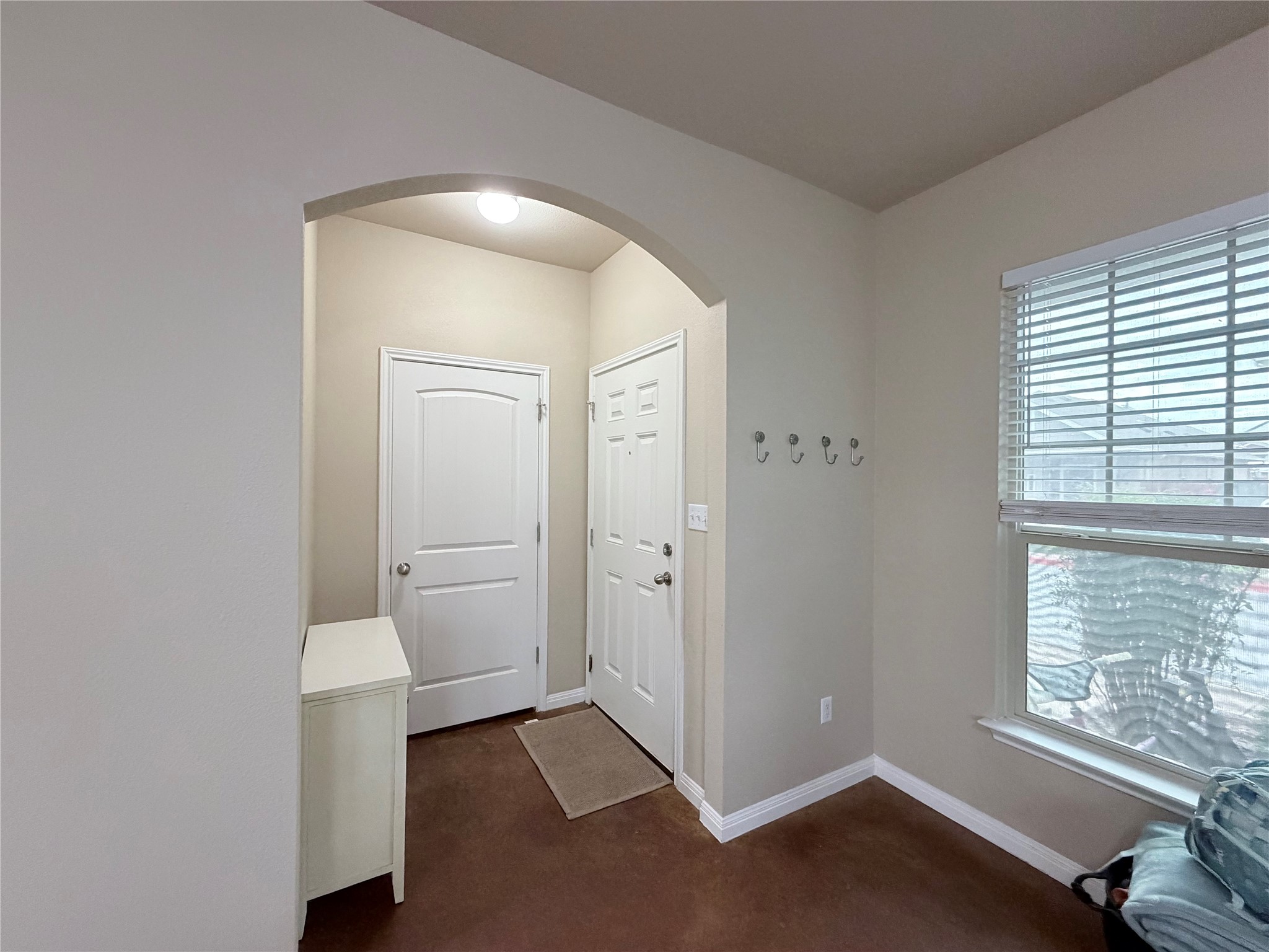 4508 Kind Way, Unit 249 Austin, TX 78725 - Photo 7 of 20 Entrance foyer with arched walkways!