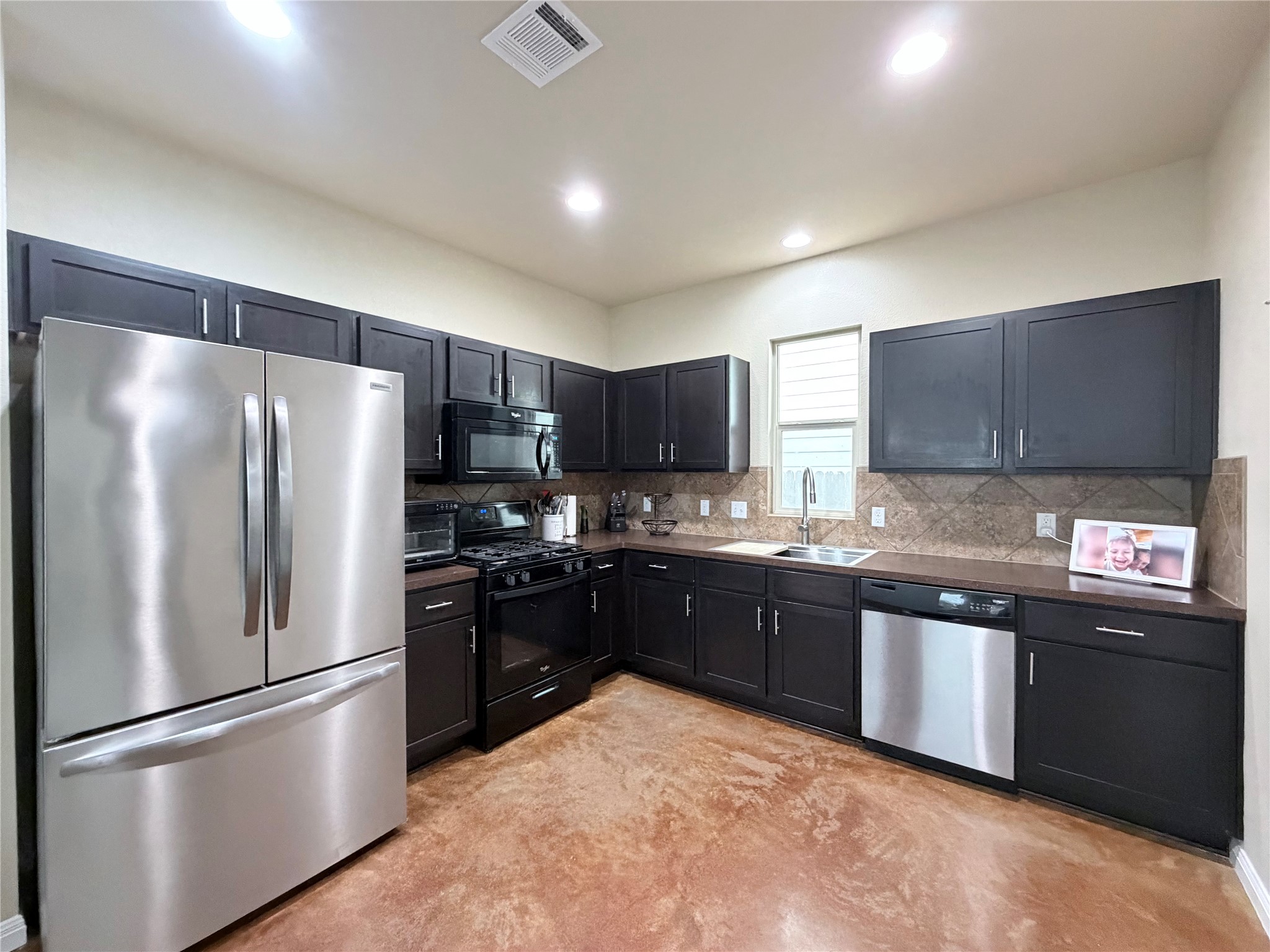 4508 Kind Way, Unit 249 Austin, TX 78725 - Photo 10 of 20 A refrigerator will be provided but it could be different than the one that is in this photo or at the house.