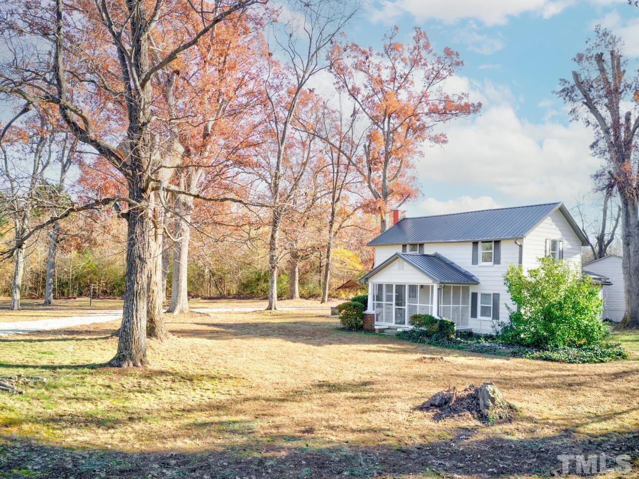 269 Hesters Store Road Roxboro, NC 27574 - Photo 17 of 30 a front view of a house with a yard