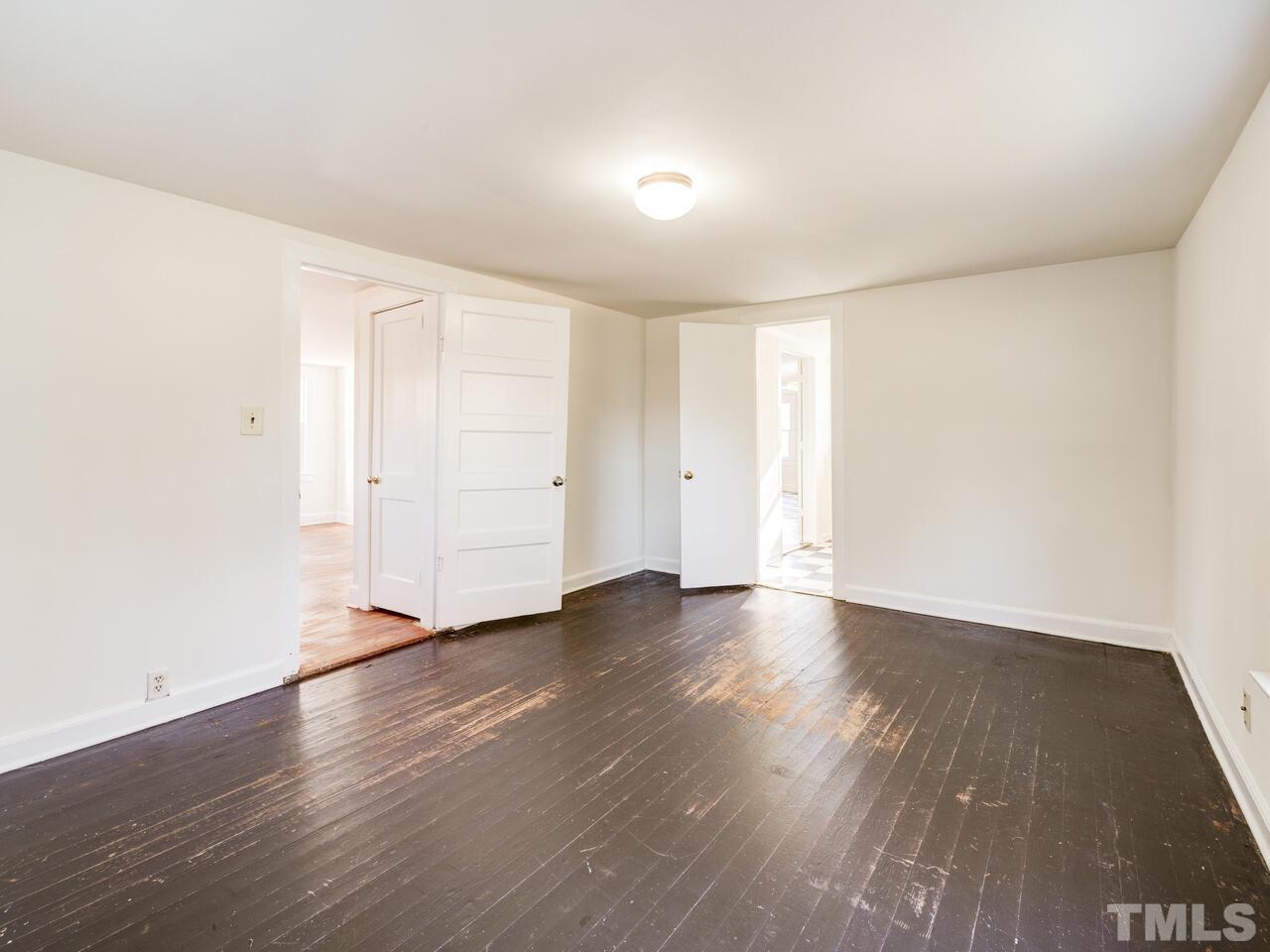 269 Hesters Store Road Roxboro, NC 27574 - Photo 19 of 30 an empty room with wooden floor