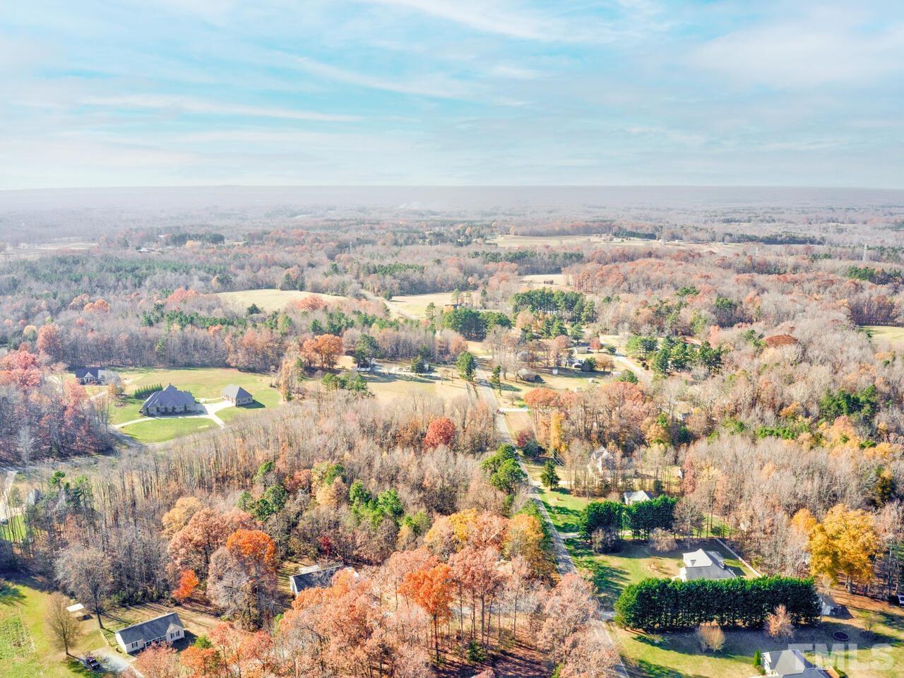 269 Hesters Store Road Roxboro, NC 27574 - Photo 28 of 30 an aerial view of residential building and lake view in back