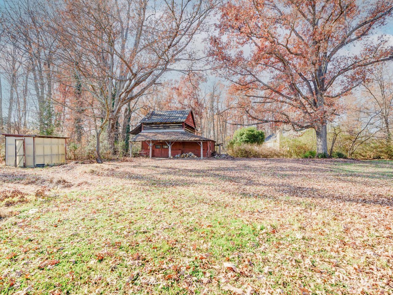 269 Hesters Store Road Roxboro, NC 27574 - Photo 7 of 30 a front view of a house with a yard covered with snow