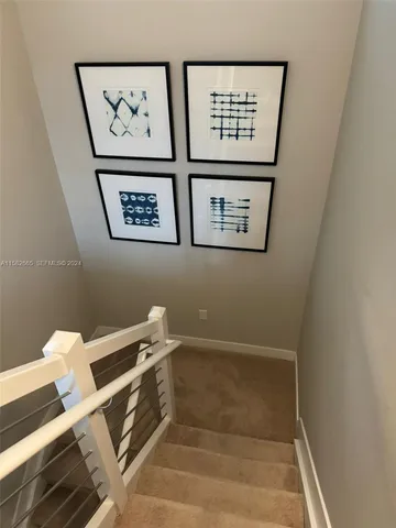 a view of room with washer and dryer