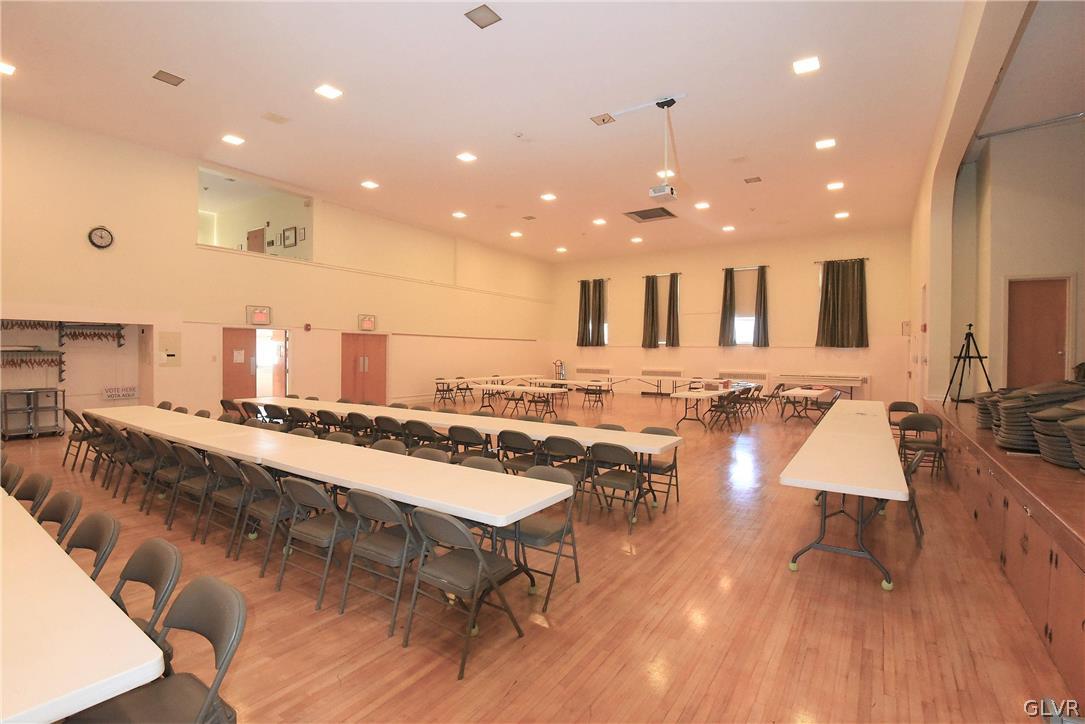 616 4th Bethlehem, PA 18015 - Photo 20 of 50 a large room with a table and chairs