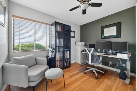 a workspace with furniture and a window