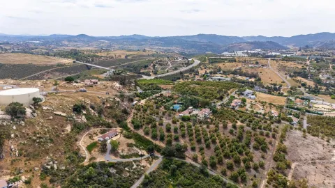 an aerial view of residential house and lake view