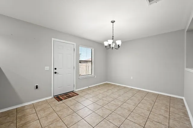 a view of an empty room with window