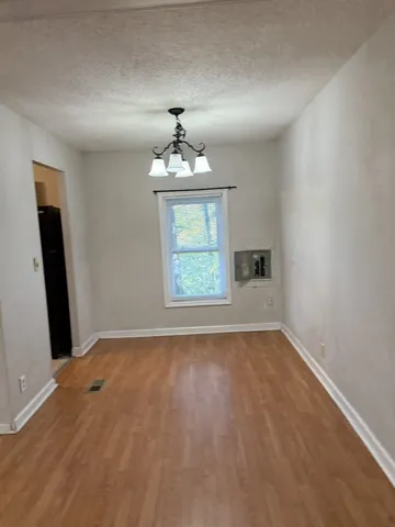a view of an empty room and window