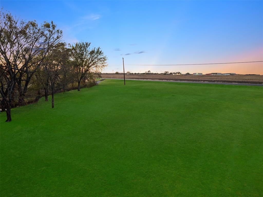191 Daniel Drive Van Alstyne, TX 75495 - Photo 30 of 30 a view of a field with tree in the background