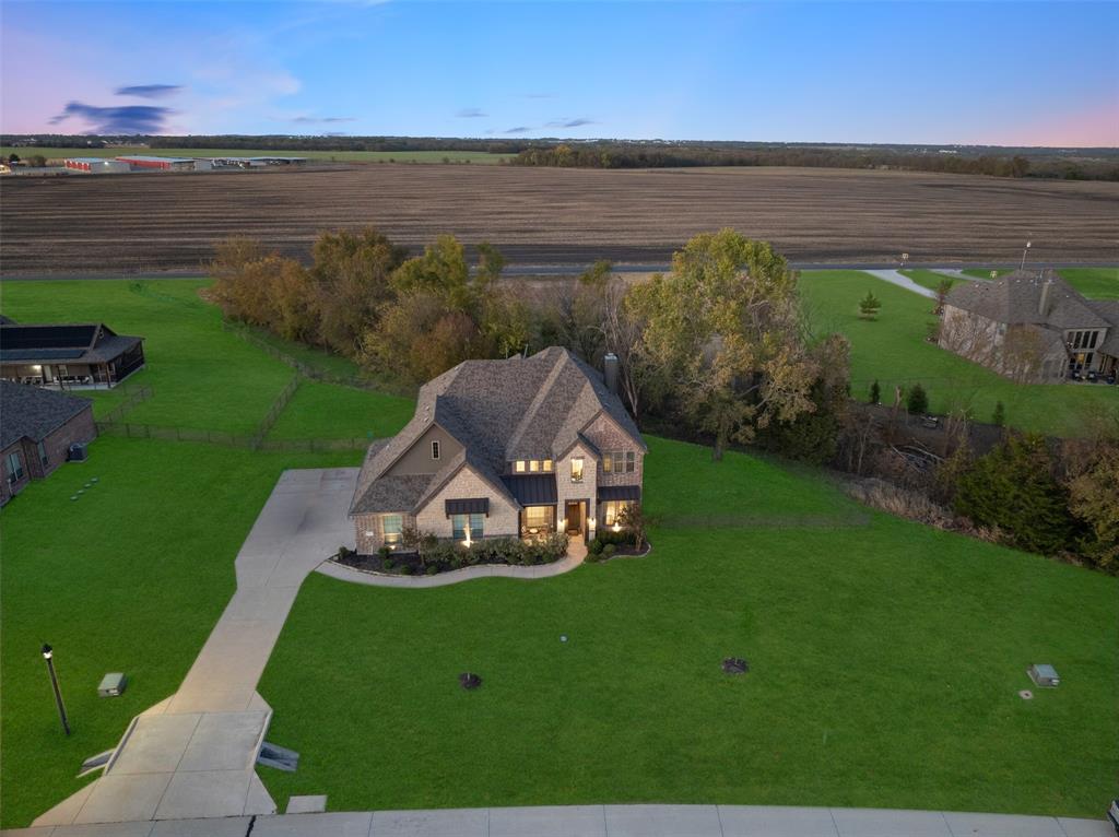 191 Daniel Drive Van Alstyne, TX 75495 - Photo 4 of 30 a view of a lake with a yard