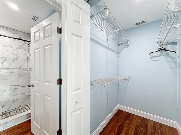 a view of a room with racks on the wall