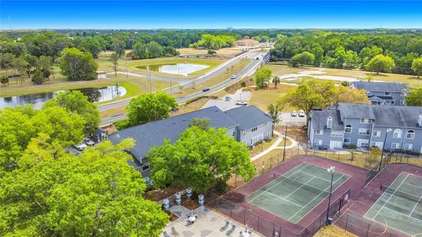a view of a swimming pool with a patio
