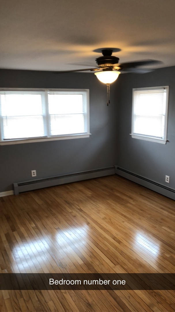 1940 Jericho Road Aurora, IL 60506 - Photo 16 of 29 a view of empty room with wooden floor