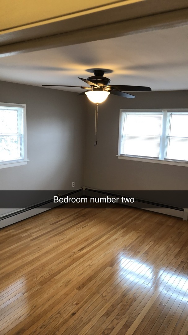 1940 Jericho Road Aurora, IL 60506 - Photo 18 of 29 a view of a room with wooden floor