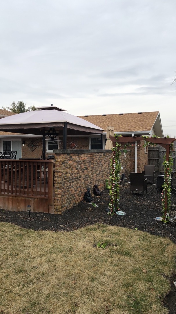 1940 Jericho Road Aurora, IL 60506 - Photo 27 of 29 a view of a house with a terrace