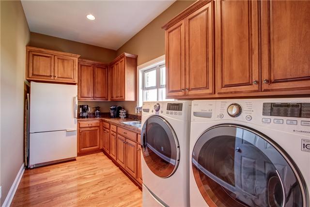 7229 Anderson Road Fairview, TN 37062 - Photo 15 of 20 What a Laundry Room!!!! Granite counters and tons of built-in cabinets and room for a second fridge!