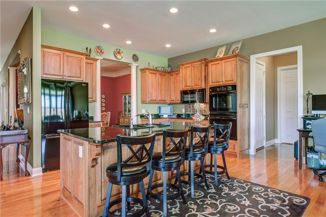 7229 Anderson Road Fairview, TN 37062 - Photo 7 of 20 Wow!!! This is a kitchen from a magazine! Sleek granite counters, center island and top of the line appliances.