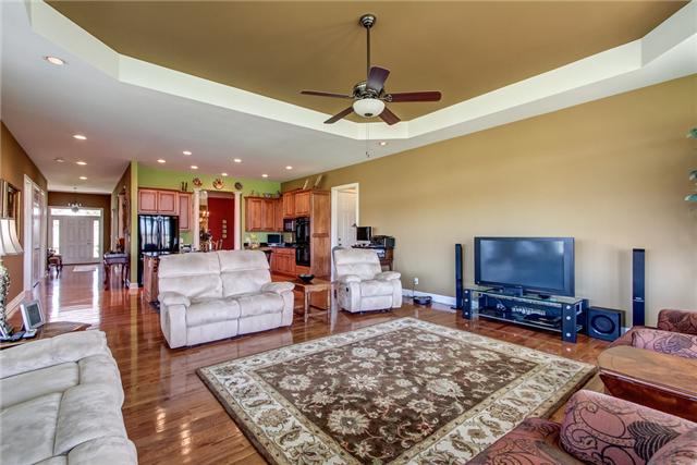 7229 Anderson Road Fairview, TN 37062 - Photo 9 of 20 Enormous family room has hardwood floors and tray ceiling and walls of windows
