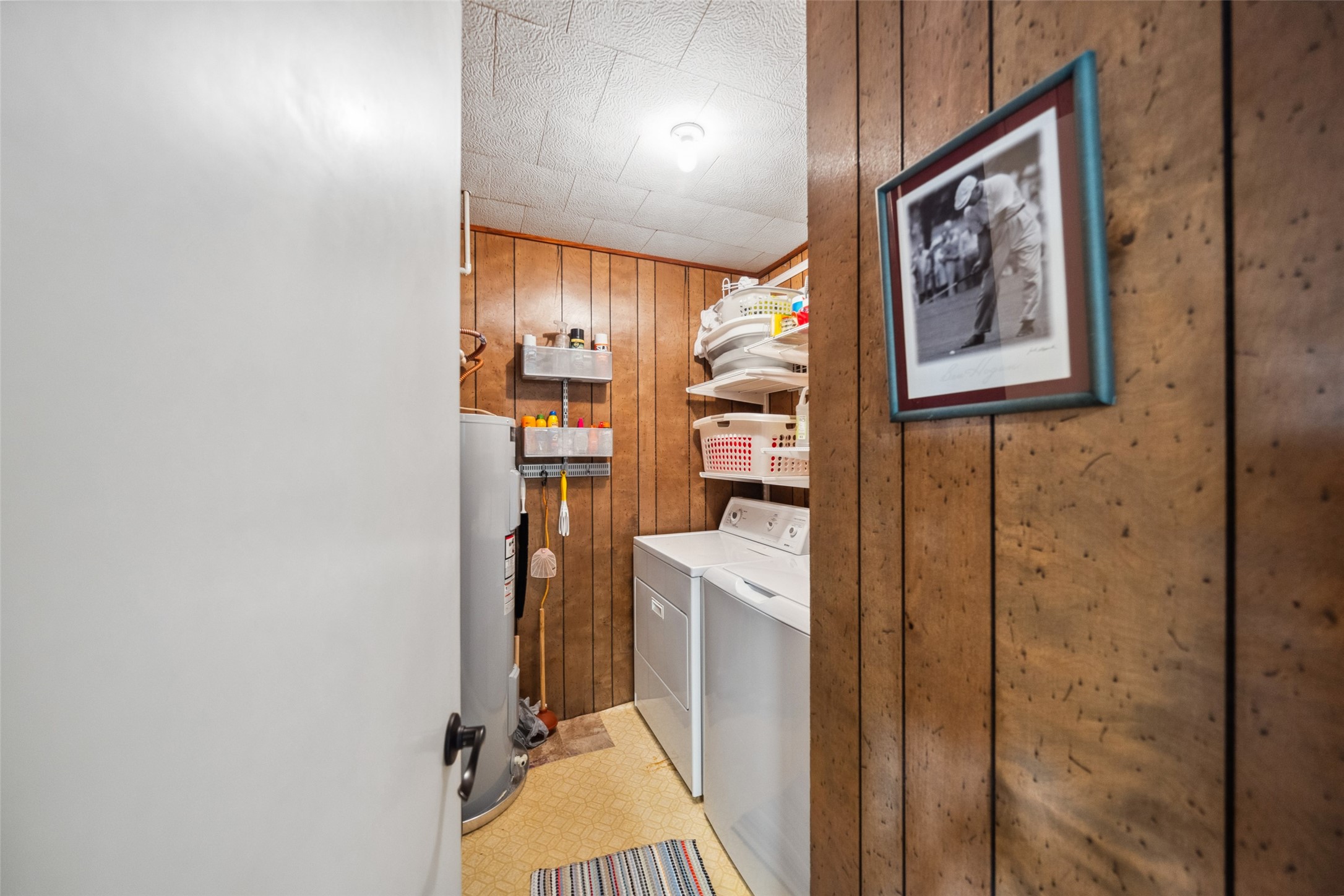 215 Selkirk Road Bay City, TX 77414 - Photo 15 of 36 a view of a hallway with paintings on the wall