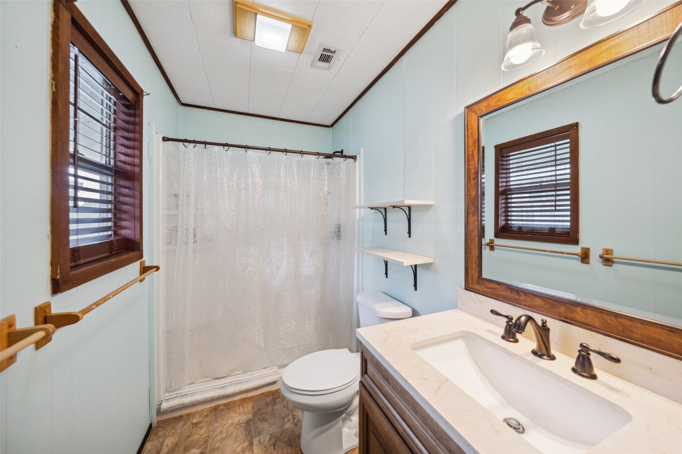 215 Selkirk Road Bay City, TX 77414 - Photo 20 of 36 a bathroom with a sink toilet and shower