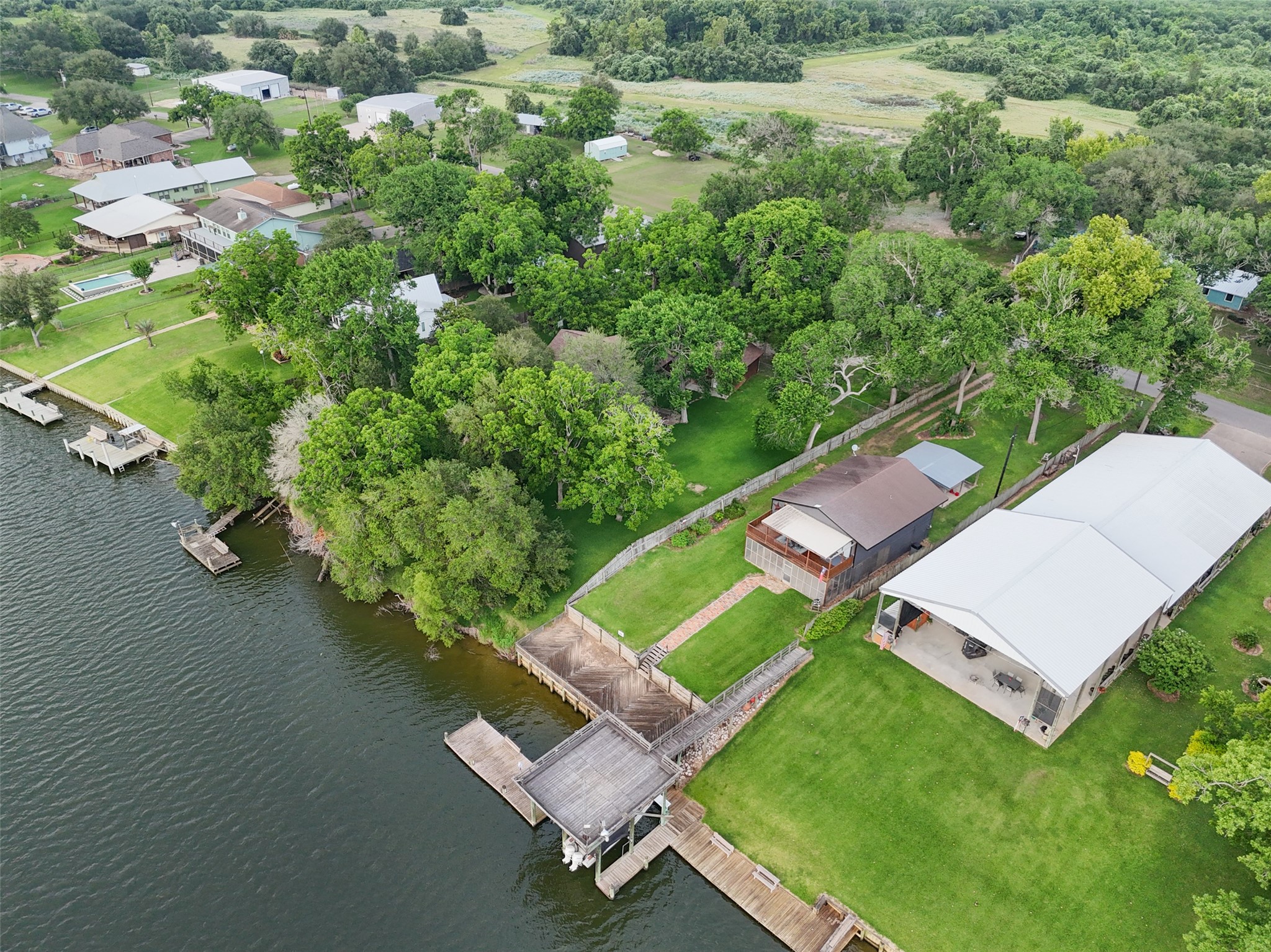 215 Selkirk Road Bay City, TX 77414 - Photo 29 of 36 an aerial view of a house with pool yard and outdoor seating