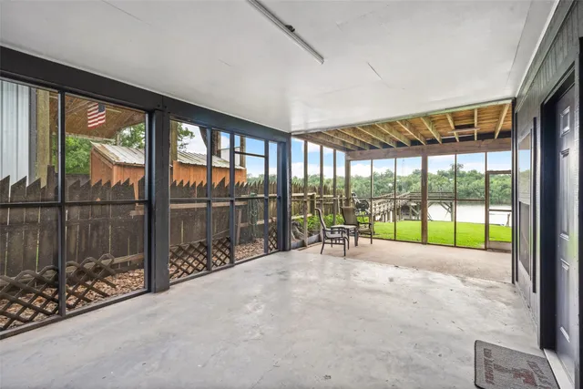 a view of an empty room with a sliding door