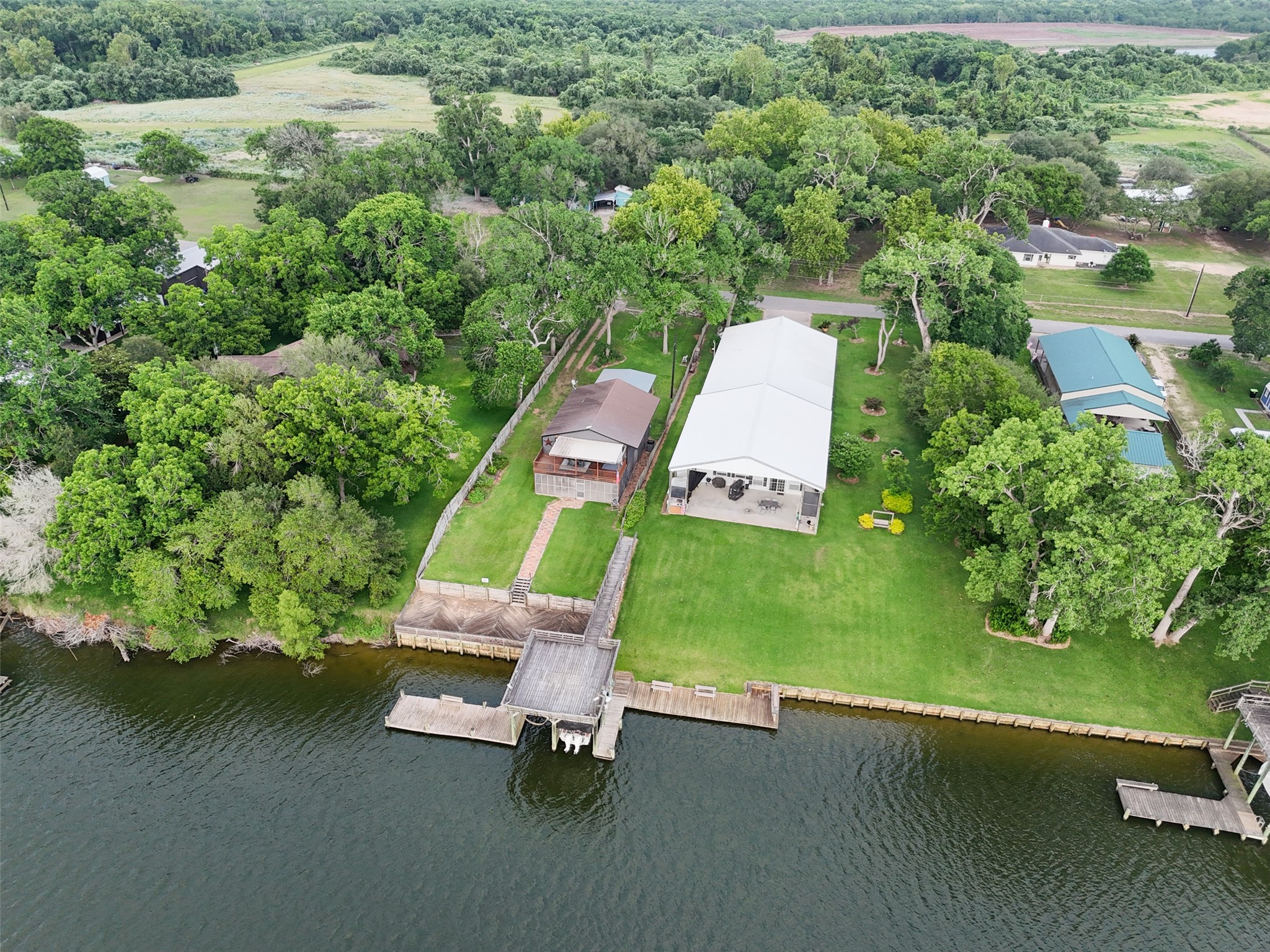 215 Selkirk Road Bay City, TX 77414 - Photo 31 of 36 an aerial view of a chairs and table on the patio