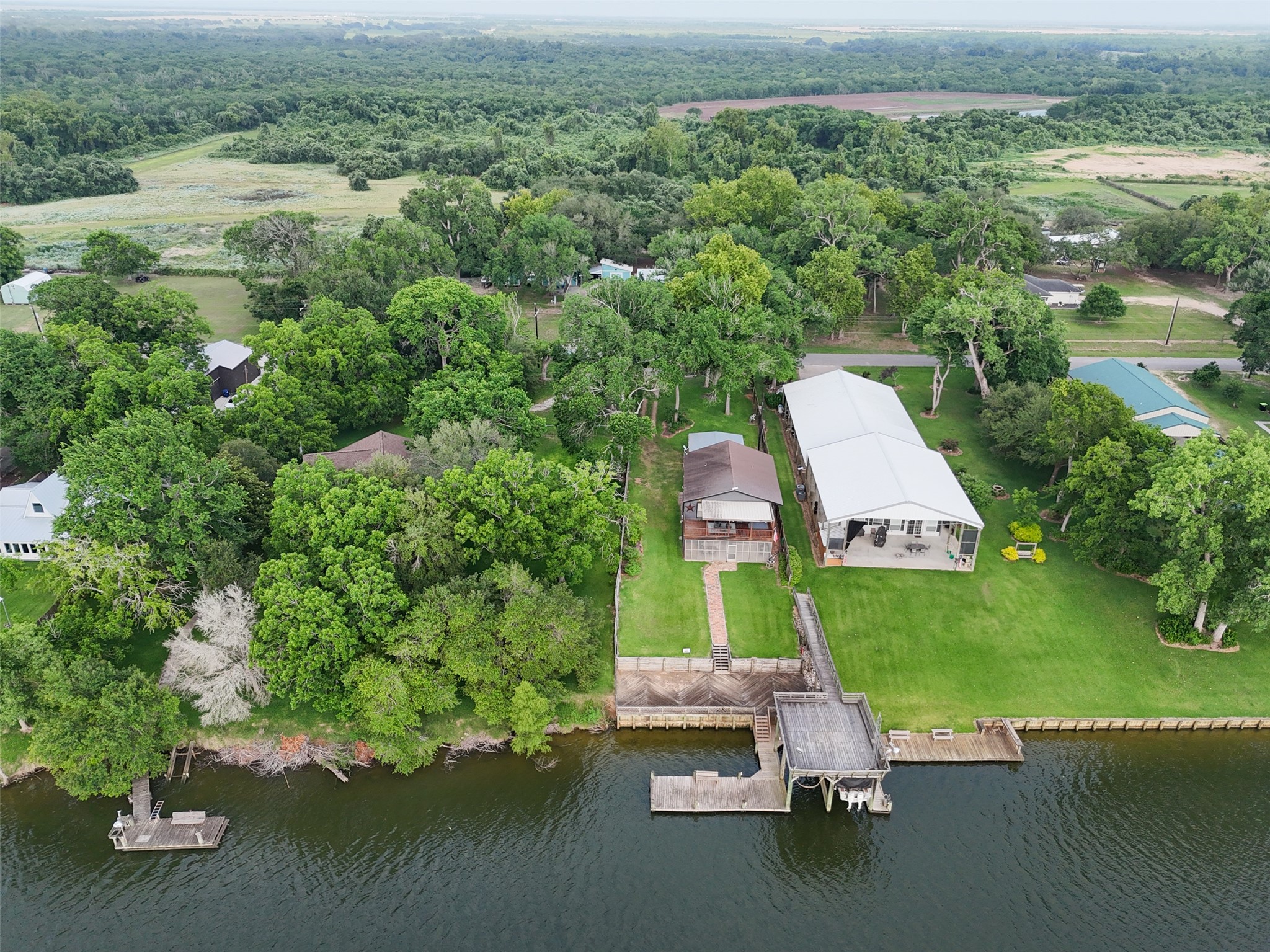 215 Selkirk Road Bay City, TX 77414 - Photo 32 of 36 an aerial view of a house with a yard